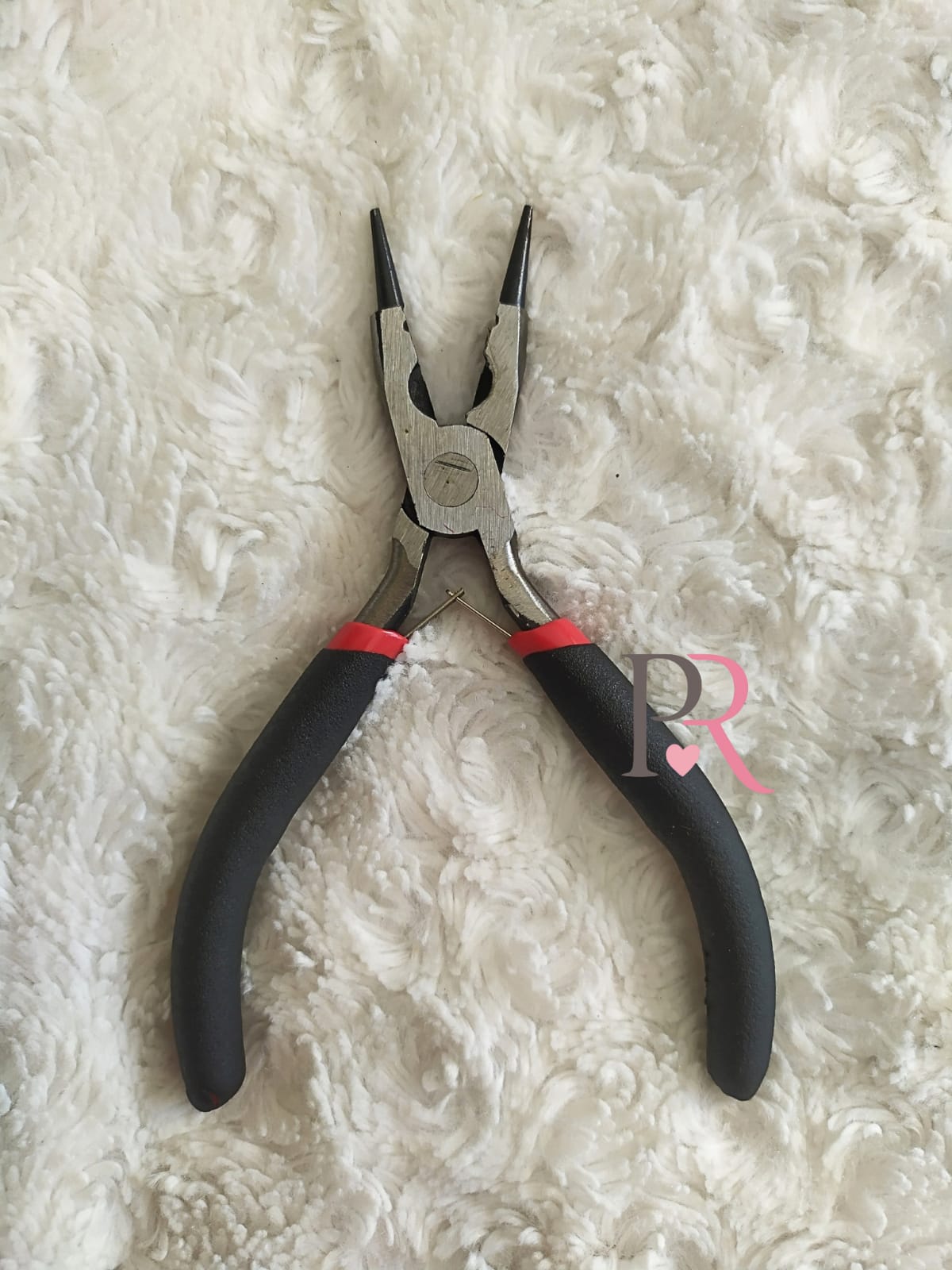 Pinza rosario mango negro