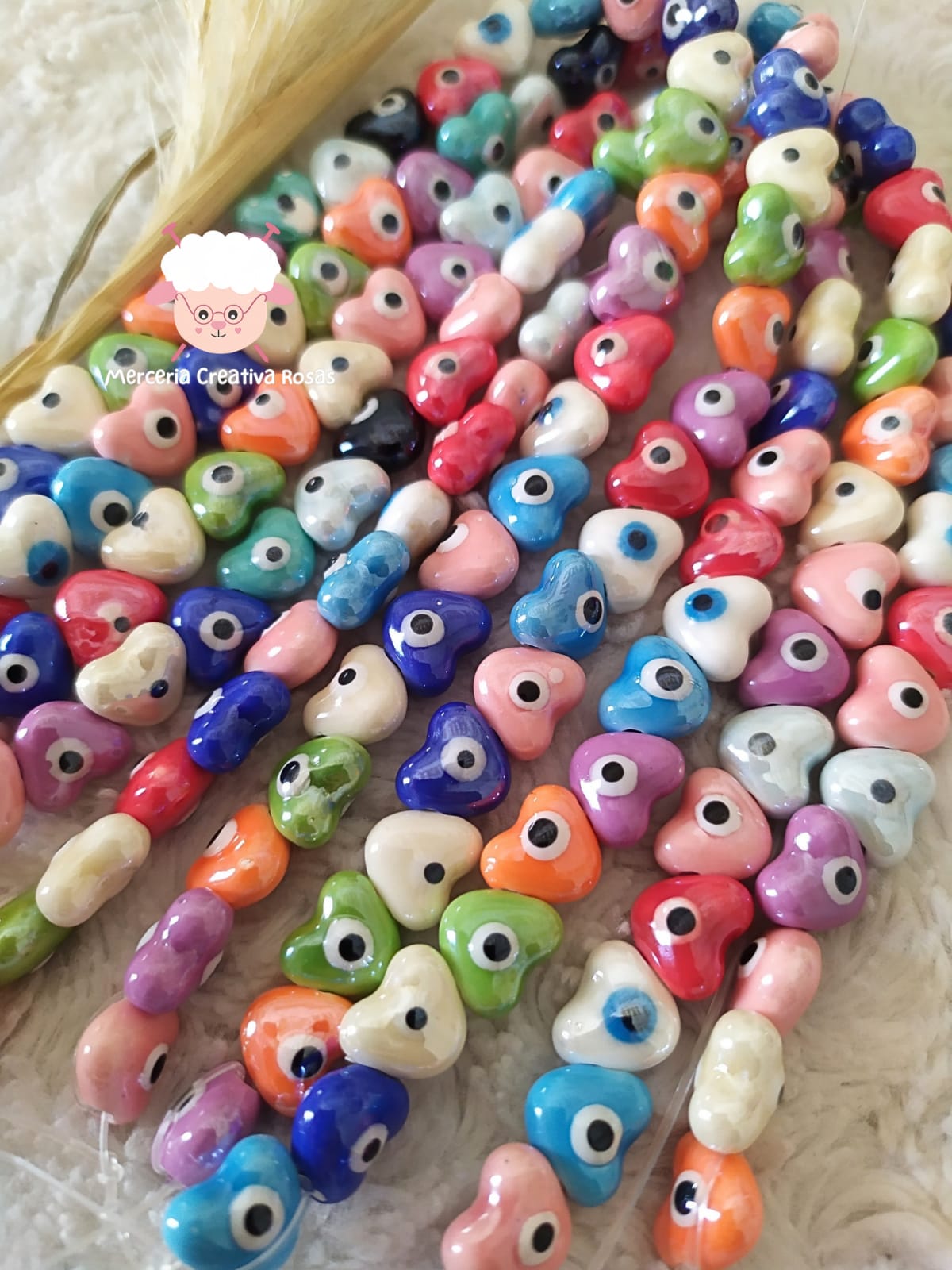 Cuentas cerámica corazón con ojo turco